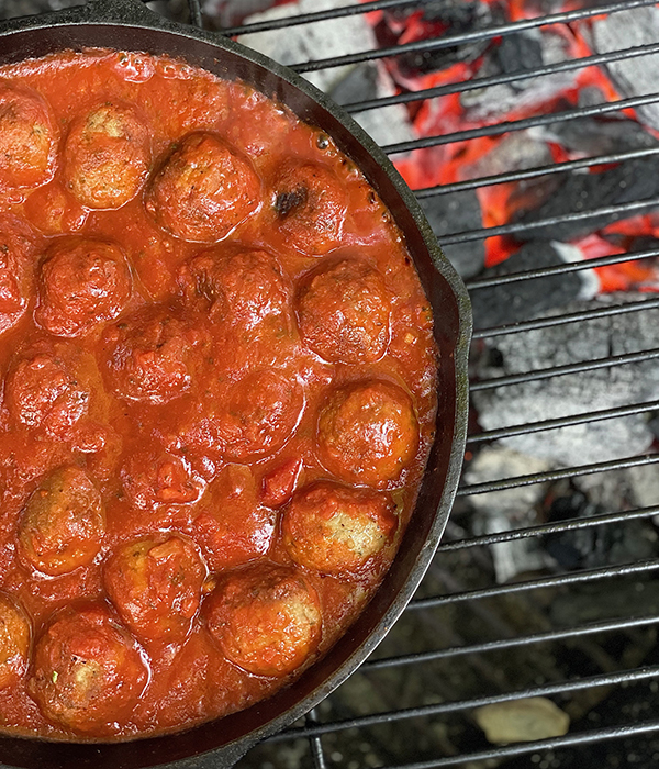 Meatballs in Sauce on Grill