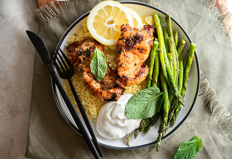 Grilled Moroccan Chicken Thighs with Couscous and Asparagus