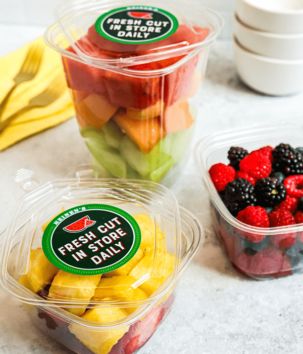 Three Short and Tall Plastic Containers of Heinen's Fan Favorite Fresh Cut Fruit