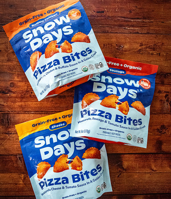 Snow Days Frozen Pizza Rolls Package on a Wood Surface