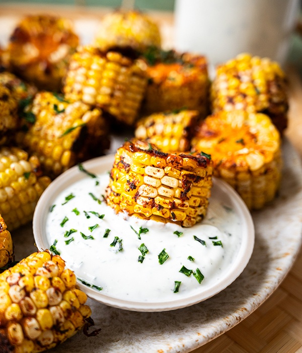 Cajun corn bites dipped in Greek yogurt ranch