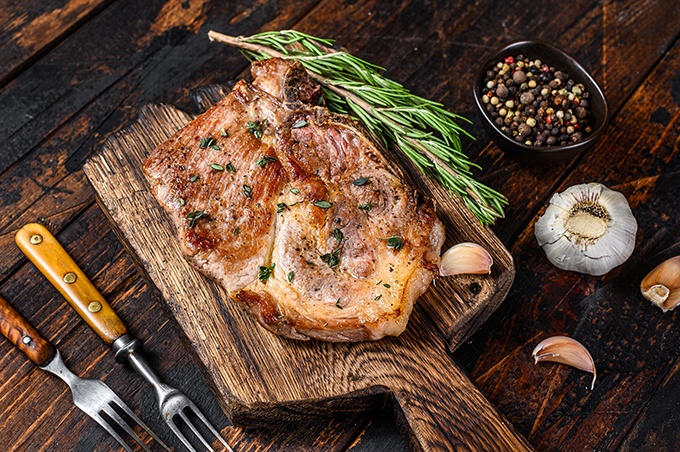 pork steak on a wooden board