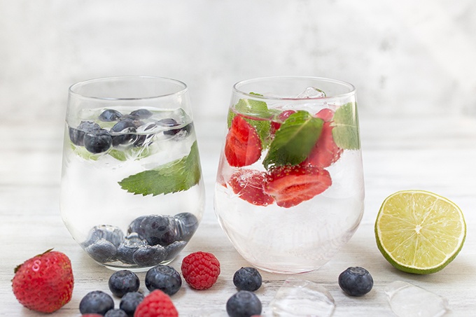 Ice water in glasses with fruit