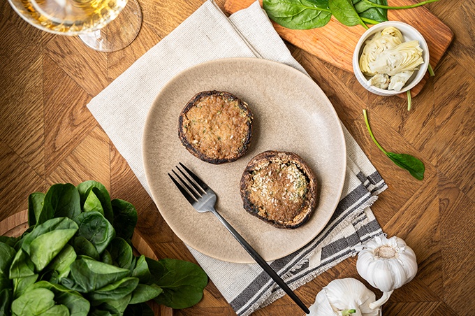 Heinen's Spinach and Artichoke Stuffed Mushrooms on a Plate