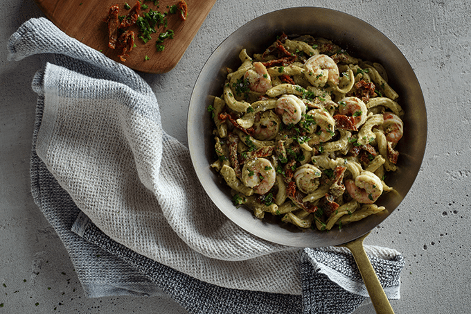 Overhead view of Shrimp Garganelli with Creamy Basil Pesto