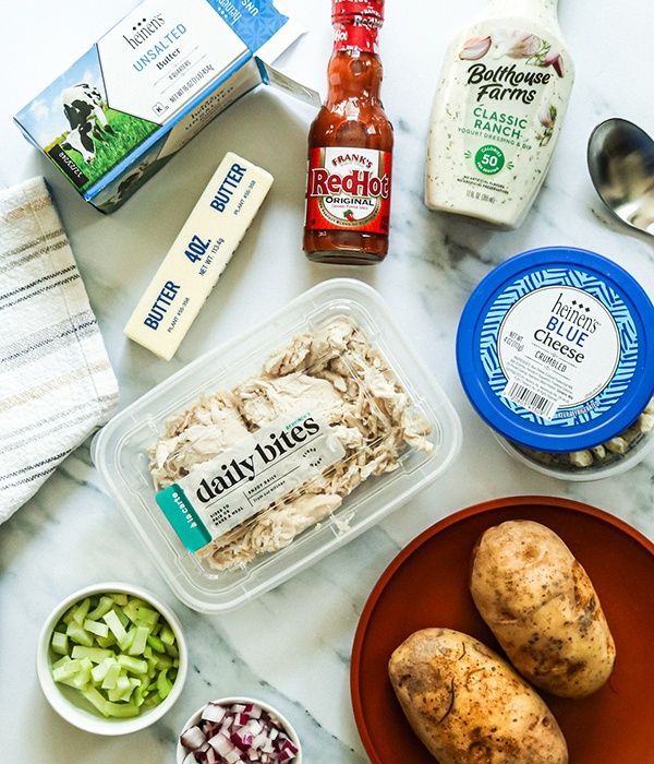 Ingredients for Buffalo Chicken Stuffed Baked potatoes, such as Heinen's Daily Bites Chicken