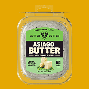 A Package of Asiago Better Butter with Chives and Herbs