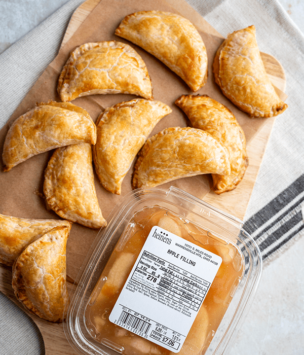 Baked Apple Hand Pies with a Container of Heinen's Apple Pie Filling