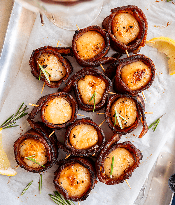 Bacon Wrapped Scallops on Parchment Paper