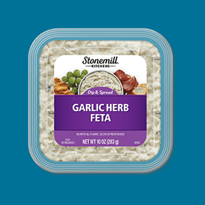 Container of Stonemill Garlic Herb Dip. 