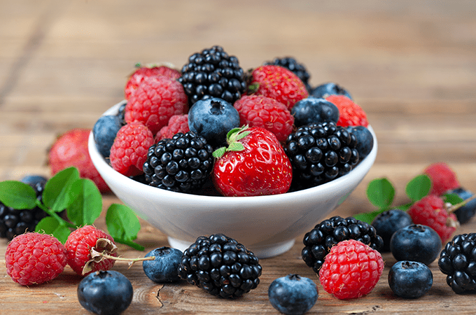 A Small Bowl of Mixed Raspberries, Blackberries, Blueberries, and Strawberries