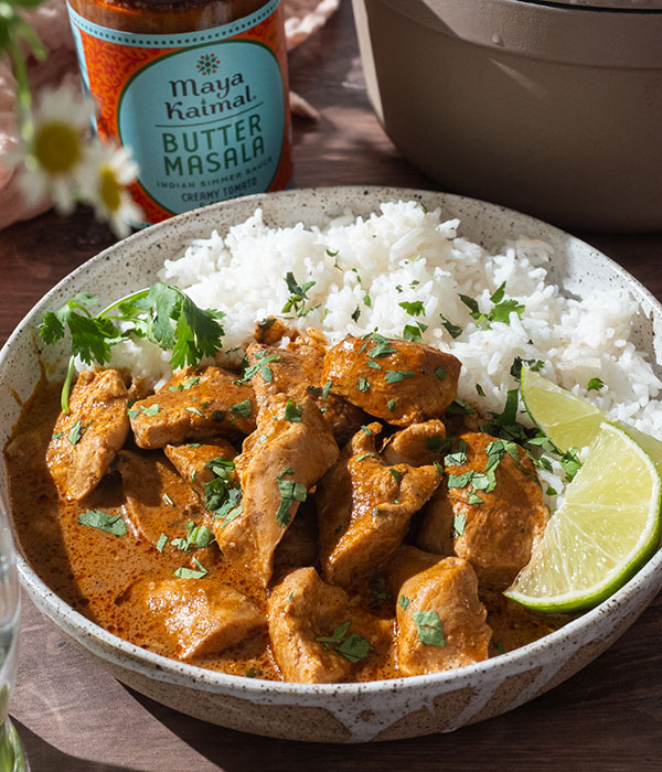 Bowl of Basmati rice with butter chicken