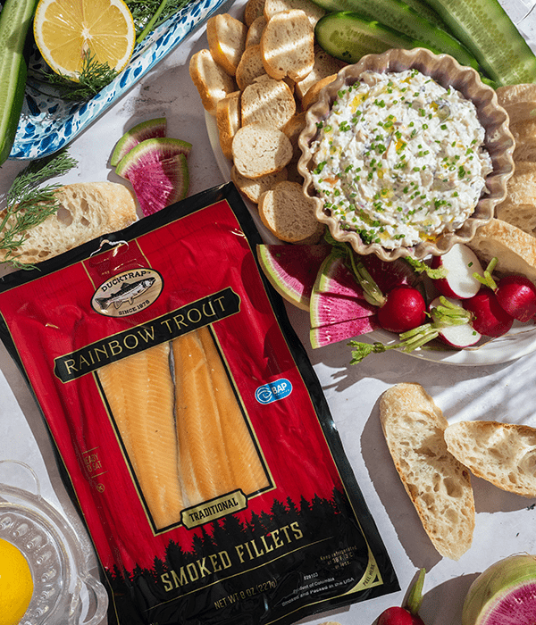 A Package of Ducktrap Smoked Trout Beside a Bowl of Smoked Trout Dip